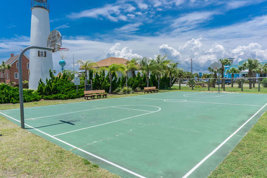 Shoot some hoops by a lighthouse